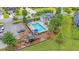Charming community pool with lounge chairs, umbrellas, a playground, and convenient parking at 602 Yellow Leaf Ln, Summerville, SC 29486