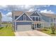 Charming two-story home featuring a well-maintained front yard and attached garage at 602 Yellow Leaf Ln, Summerville, SC 29486