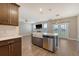 Stylish kitchen with an island, stainless steel appliances, and easy access to the living area at 602 Yellow Leaf Ln, Summerville, SC 29486