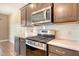 Modern kitchen with stainless steel appliances, granite countertops, and ample cabinet space at 602 Yellow Leaf Ln, Summerville, SC 29486