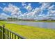 Scenic view of the pond and surrounding community from the backyard of the property at 602 Yellow Leaf Ln, Summerville, SC 29486