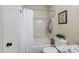 Bathroom with a shower/tub combo, patterned tile accents, and a decorative nautical theme at 700 Daniel Ellis Dr # 5103, James Island, SC 29412