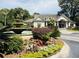 Beautiful clubhouse with a classic water fountain surrounded by bright colored landscaping at 700 Daniel Ellis Dr # 5103, James Island, SC 29412