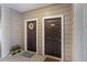 A welcoming entrance with a welcome mat, flower pot and wreath decorates the front door at 700 Daniel Ellis Dr # 5103, James Island, SC 29412