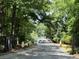 Gated community entrance surrounded by lush trees and landscaping at 700 Daniel Ellis Dr # 5103, James Island, SC 29412