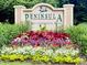 Beautifully landscaped entrance sign for the Peninsula luxury condominium resort at 700 Daniel Ellis Dr # 5103, James Island, SC 29412