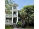 Exterior view of condo building with multiple floors, stairs, and balconies at 700 Daniel Ellis Dr # 5103, James Island, SC 29412