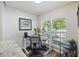 Functional home office space with a modern desk, ergonomic chair, and large window at 700 Daniel Ellis Dr # 5103, James Island, SC 29412