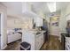 Bright kitchen featuring granite countertops, stainless steel appliances, and hardwood floors at 700 Daniel Ellis Dr # 5103, James Island, SC 29412