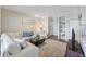 Comfortable living room features a large sectional sofa, built-in shelving, and a ceiling fan at 700 Daniel Ellis Dr # 5103, James Island, SC 29412