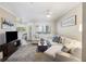 Bright living room with a plush sectional sofa, neutral tones, and a ceiling fan at 700 Daniel Ellis Dr # 5103, James Island, SC 29412