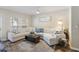 Comfortable living room area with large couch, wooden floors and a ceiling fan at 700 Daniel Ellis Dr # 5103, James Island, SC 29412