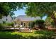 Well-maintained backyard with a deck and seating, perfect for outdoor entertaining at 708 Lawton Harbor Dr, Charleston, SC 29412