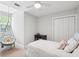 Cozy bedroom with a hanging chair, a desk, and a neutral color scheme at 708 Lawton Harbor Dr, Charleston, SC 29412