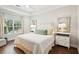 Serene bedroom with a cozy bed, neutral decor, and natural light from the window, creating a relaxing atmosphere at 708 Lawton Harbor Dr, Charleston, SC 29412