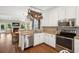 Modern kitchen with white cabinets, granite countertops, and stainless steel appliances at 708 Lawton Harbor Dr, Charleston, SC 29412