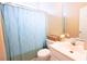 Bathroom featuring a blue leaf-patterned shower curtain, toilet, and white vanity with sink at 714 Alwyn Blvd, Summerville, SC 29485