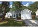 Charming single-story home featuring a well-manicured lawn and attached one car garage in a desirable neighborhood at 714 Alwyn Blvd, Summerville, SC 29485