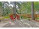 Enjoy this private backyard featuring a patio, lawn, and charming fence, perfect for outdoor relaxation at 801 Long Drive Rd, Summerville, SC 29485