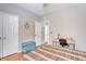 Welcoming bedroom boasts hardwood floors, neutral walls, and ample natural light for a restful ambiance at 801 Long Drive Rd, Summerville, SC 29485