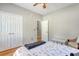 Bright bedroom featuring hardwood floors, double closets, and neutral paint, creating a serene space at 801 Long Drive Rd, Summerville, SC 29485