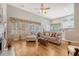 Bright living room boasting hardwood floors, fireplace, and views to the backyard at 801 Long Drive Rd, Summerville, SC 29485