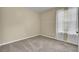 Neutral carpeted bedroom with window letting in lots of natural light at 9016 Greenbriar Dr, Summerville, SC 29485