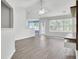 Bright and airy living room with hardwood floors and a sliding glass door at 9016 Greenbriar Dr, Summerville, SC 29485
