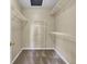 Well-organized walk-in closet features wire shelving and a skylight at 9016 Greenbriar Dr, Summerville, SC 29485