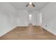 Bright bedroom with hard wood floors, a ceiling fan, and adjoining bathroom and closet at 902 Greenmeadow Dr, Goose Creek, SC 29445