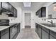 Contemporary kitchen featuring black cabinetry, stainless steel appliances and recessed lighting at 902 Greenmeadow Dr, Goose Creek, SC 29445