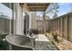 Cozy patio with outdoor seating and views of the surrounding landscape, perfect for relaxation at 902 Greenmeadow Dr, Goose Creek, SC 29445