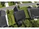 Aerial view of a well-maintained home with a fenced yard and mature trees in a residential neighborhood at 9680 Spencer Woods Rd, Ladson, SC 29456
