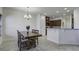 Charming dining area adjacent to the kitchen, perfect for Gathering meals and entertaining guests at 9680 Spencer Woods Rd, Ladson, SC 29456