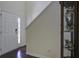 Bright entryway with hardwood floors and a staircase leading to the upper level at 9680 Spencer Woods Rd, Ladson, SC 29456
