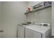 Convenient laundry room with modern washer and dryer units at 9680 Spencer Woods Rd, Ladson, SC 29456