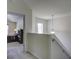 Upstairs hallway with view into bedroom at 9680 Spencer Woods Rd, Ladson, SC 29456