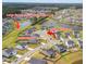 Aerial view of the property showcasing a large easement space behind the lot and a cul-de-sac location at 102 Bolsena Ct, Summerville, SC 29486
