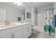 Well-lit bathroom featuring a white vanity, neutral paint and coordinated shower curtain at 105 Plowden Mill Ct, Summerville, SC 29485