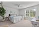 Comfortable bedroom featuring natural light, white trim, and stylish furniture with a calming atmosphere at 105 Plowden Mill Ct, Summerville, SC 29485
