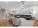 Spacious living room is open to the kitchen and features a large sectional sofa at 105 Plowden Mill Ct, Summerville, SC 29485
