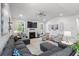 Bright living room with fireplace and decorative furniture provides a cozy space at 105 Plowden Mill Ct, Summerville, SC 29485