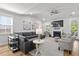 Cozy living room with modern lighting and a fireplace at 105 Plowden Mill Ct, Summerville, SC 29485