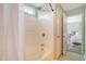 Bathroom featuring a bathtub, shower, and access to the primary bedroom at 1052 Whitlow Blvd, Summerville, SC 29483