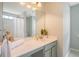 Well-lit bathroom with a vanity, mirror, and bathtub with shower at 1052 Whitlow Blvd, Summerville, SC 29483