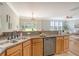 Spacious kitchen with stainless steel appliances, ample counter space, and a view into the living area at 1052 Whitlow Blvd, Summerville, SC 29483
