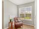 Inviting sitting area with a leather chair near a large window at 1052 Whitlow Blvd, Summerville, SC 29483