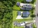 An aerial view showcases a home with a well-maintained yard, complemented by mature trees for added privacy at 1070 Moss Grove Dr, Moncks Corner, SC 29461