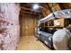 The attic has exposed rafters, pink insulation, and an air conditioning system at 1070 Moss Grove Dr, Moncks Corner, SC 29461