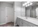 Well-lit bathroom features a large vanity, bright lighting, hard surface flooring, and a shower with glass doors at 1070 Moss Grove Dr, Moncks Corner, SC 29461